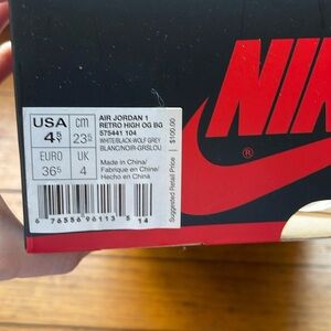 Air Jordan 1 Retro High “Black/White/Wolf Grey” in youth size 4.5Y.